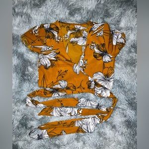 Orange floral wrap top